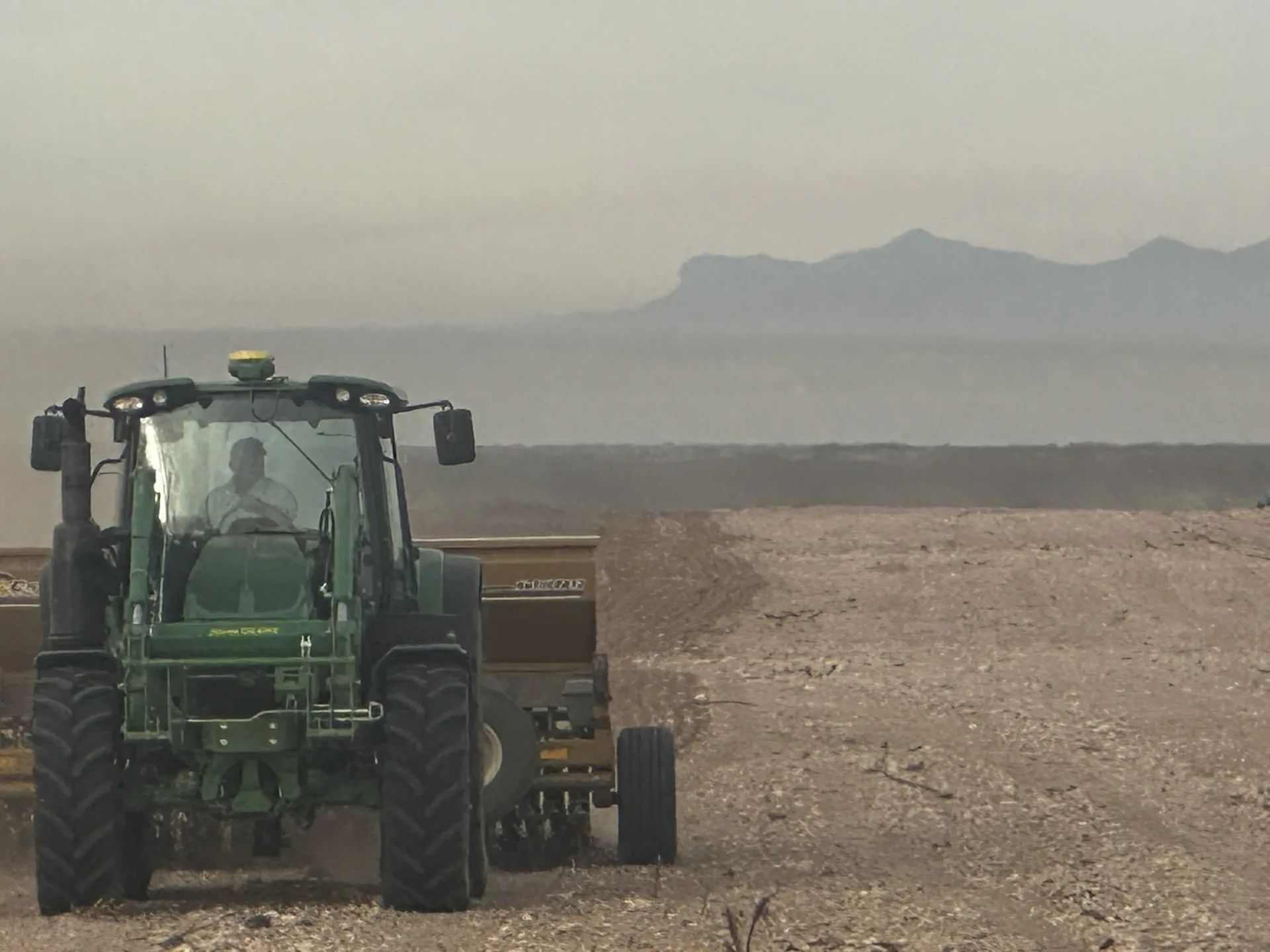 Seeding equipment working on a West Texas right-of-way